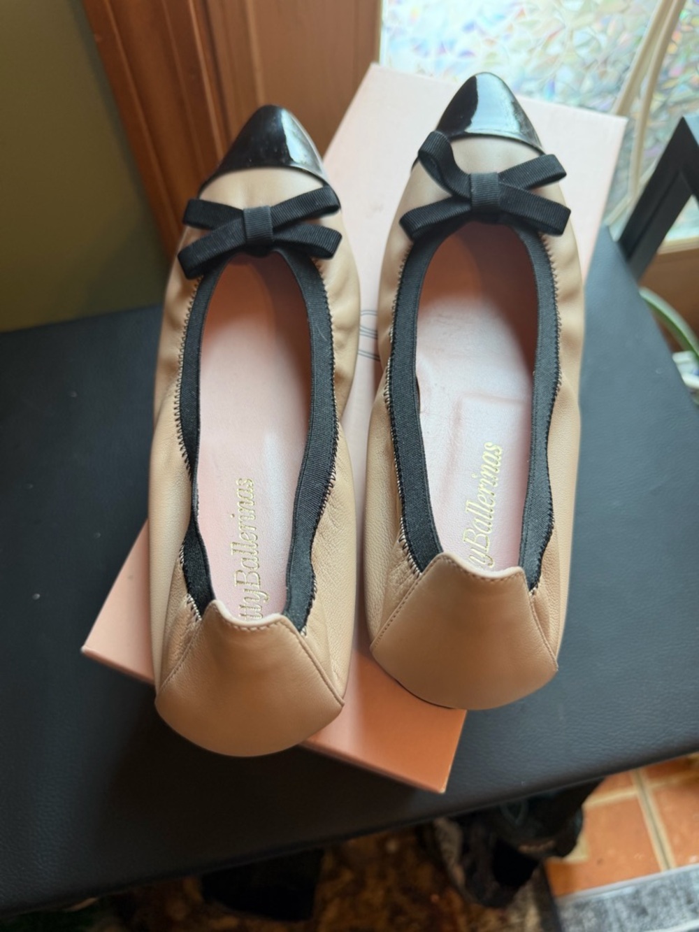 Pretty Ballerinas Nude Leather Ballet Flats with Black Cap Toe and Bow
